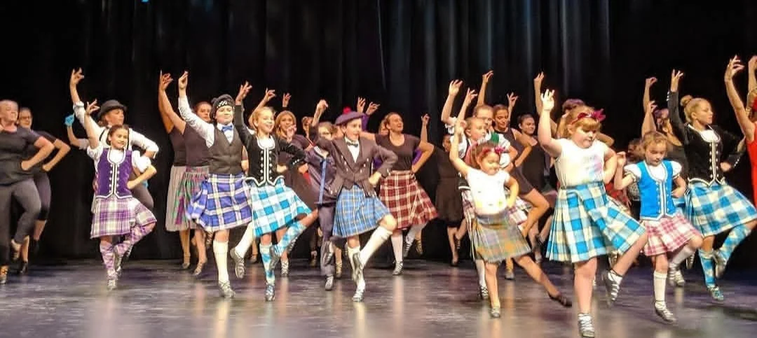 Katharine Robinson dancers performing Highland dance on stage